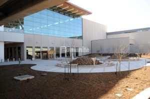 View towards terminal at Kansas City Airport in Kansas City, MO, featuring Bomanite Sandscape Texture decorative concrete installed by Musselman & Hall Contractors.