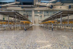 Macro view of flooring in the multipurpose room at John Diemer Elementary in Overland Park, KS, featuring Bomanite Custom Polishing Systems using Bomanite Renaissance installed by Bomanite Licensee Musselman and Hall Contractors, LLC.