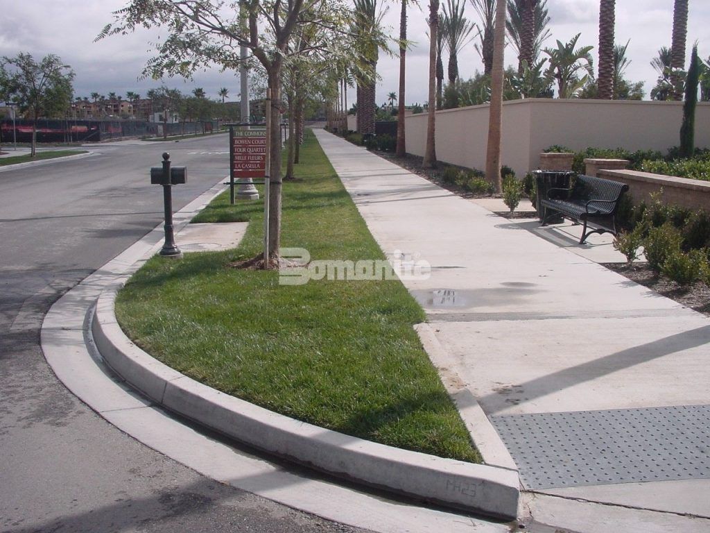 Median showing Fully Concealed Grasscrete Molded Pulp Former Systems pervious concrete installed by Clubb Grading.