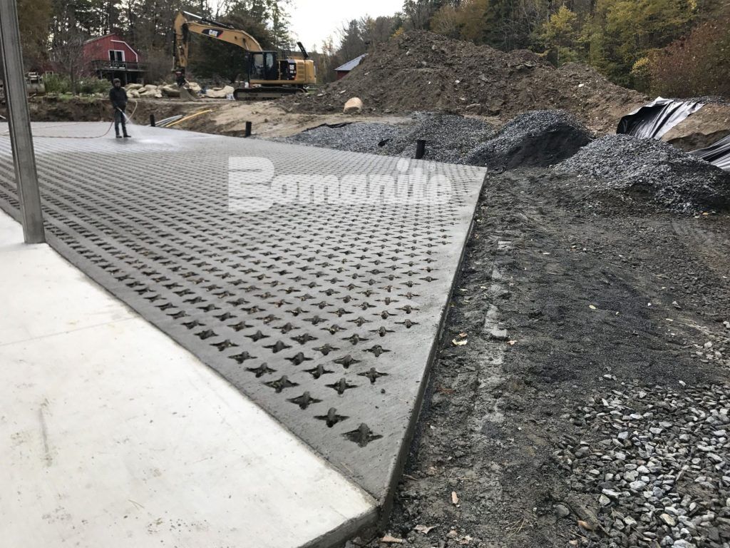 Wendt Residence in Massachusetts showcases Grasscrete Molded Pulp Former Systems pervious concrete installed by Bomanite Licensee Premier Concrete Construction.
